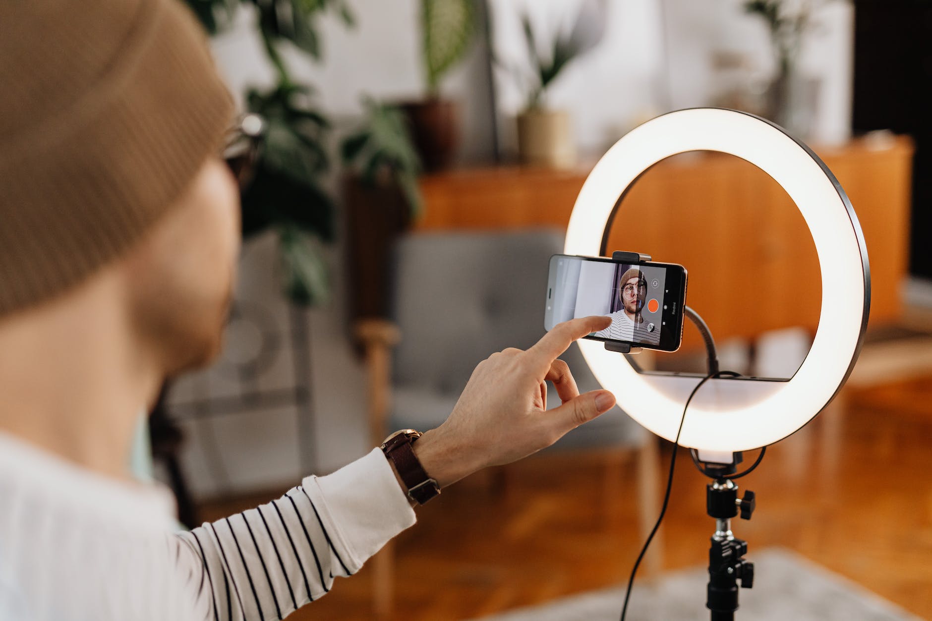 selective focus photo of a man doing a vlog